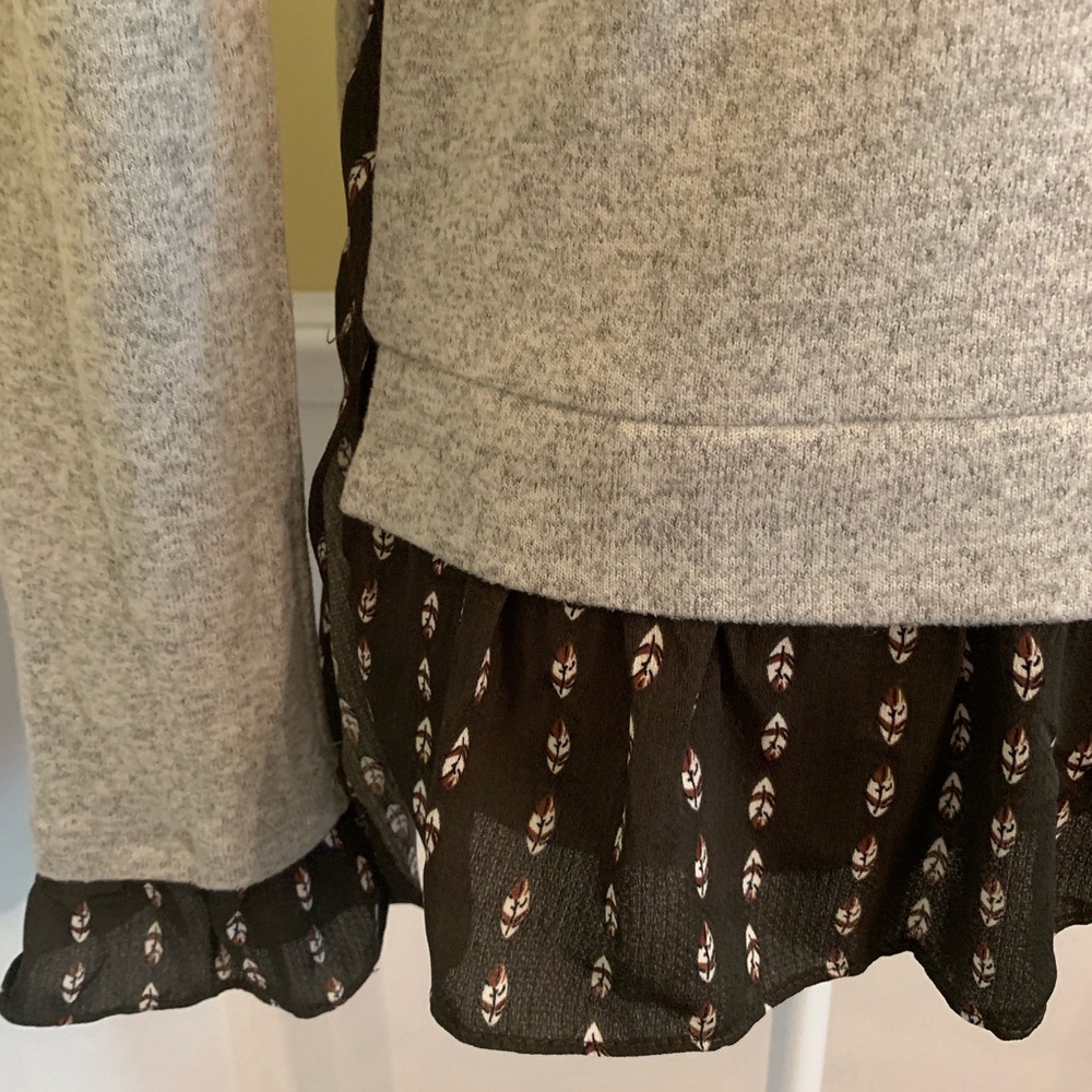 Sweater with ruffle waist and wrists